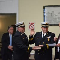 <p>Mount Kisco Second Assistant Fire Chief John Boddie is sworn in.</p>