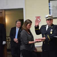 <p>Mount Kisco Third Assistant  Fire Chief David Hughes is sworn in.</p>
