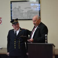 <p>Former Mount Kisco Fire Commissioner Lanson Hyatt was honored. Mayor Michael Cindrich, right, holds a plaque.</p>