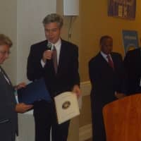<p>White Plains Mayor Thomas Roach presents Hon. Jo Ann Friia with a proclamation. </p>
