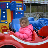 <p>Lianna Martone, 4, on a Somers carnival ride.</p>
