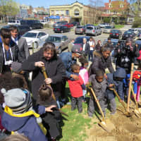 <p>Students and teachers from the New Rochelle Day Nursery School planting trees.</p>