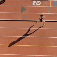 <p>Hannah DeBalsi casts a solitary shadow as she strides ahead of the pack in the 3,000 meters Thursday at the Penn Relays.</p>