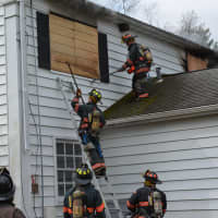 <p>Firefighters practice at a New Castle home.</p>