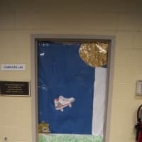 <p>Sixth-graders show their team spirit with the saying &quot;We Take the Flight Together.&quot;</p>