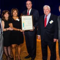 <p>Deputy Westchester County Executive Kevin Plunkett, center, presents a proclamation at the gala. Others in the photo, from left, are Edward Foley, Elaina Mango, Susan B. Wayne, Kevin Plunkett, Douglas McClintock and Howard Greenberg.</p>
