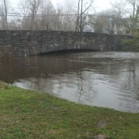 <p>The Mill River in Fairfield was over flowing after the overnight rain fall. </p>