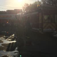 <p>Fire trucks respond to a blaze at Izzo and Son Country Gardens on the Post Road in Westport on Thursday. </p>