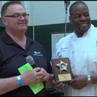 <p>Darrell Belcher of Roasted Peppers and TD Bank&#x27;s John Bojko. Roasted won top prize for Best Ribs.</p>