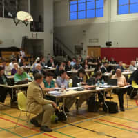 <p>Members of the Fairfield Representative Town Meeting vote to cut $500,000 from the Board of Education budget for the 2014-15 year. </p>
