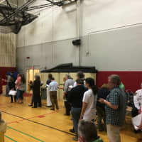 <p>A line of people of more than 40 residents wraps around the Fairfield Warde High School small gym when the public was allowed to speak to the RTM, the majority spoke against the cut to the education budget.</p>