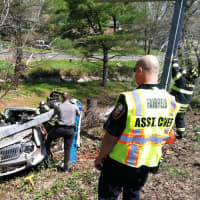 <p>Fairfield Fire Department Incident Commander Assistant Chief George Gomola at the accident scene Wednesday morning.</p>