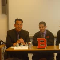 <p>Athletic Director Chris Drosopoulous and Guidance Counselor Nathan Hetzel congratulate Jon Cobeca on playing soccer at SUNY Plattsburgh.</p>