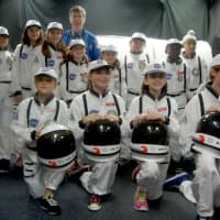 <p>The Young Astronauts of Columbus Magnet School celebrate the culmination of their simulated mission, Terra Nova.</p>