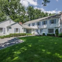 <p>The home at 4 Parsons Walk in Darien offers close-to-town privacy. </p>