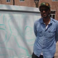 <p>Norwalk-based artist Jahmane chose &quot;Where the Wild Things Are&quot; as his inspiration for his traffic box art outside 50 Washington St.</p>