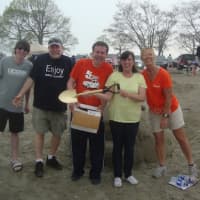 <p>The winners of the People&#x27;s Choice award for their Fudgy the Whale creation at the Castles in the Sand fundraiser in Westport.</p>