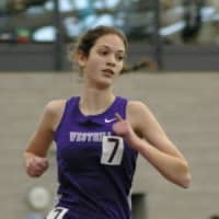 <p>Claire Howlett, a senior from Westhill High School in Stamford, set a state record Friday in the 5,000 meters at a meet in Woodbridge.</p>