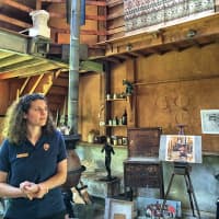 <p>Weir Farm museum technician Jessica Kuhnen, in the Mahonri Young studio on the property, said this was where he made many of his large sculptures. </p>