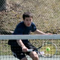 <p>Harry Solomon of Bedford approaches the net. He plays No. 2 singles and No. 1 doubles for the unbeaten Cavaliers.</p>
