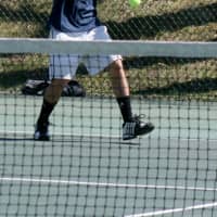 <p>Tyler Levy of Chappaqua hits a shot for Harvey&#x27;s boys tennis team.</p>