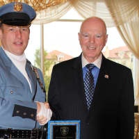 <p>Police Officer of the Year John Ladeairous with New Rochelle Police Commissioner Patrick Carroll.</p>