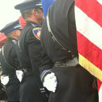 <p>Stamford Police honor guard members stand during the annual Stamford Police Memorial Day.</p>