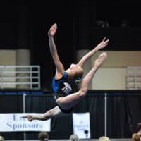 <p>Ashlyn Wahl competes on the floor exercise.</p>