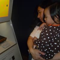 <p>Parents brought the next generation of video game players to the Hudson River Museum&#x27;s &quot;The Art of Video Games&quot; in Yonkers.</p>