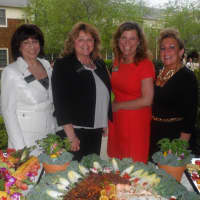 <p>Staff members from Atria hosted the party for outgoing Darien Chamber of Commerce President Carol Wilder-Tamme.</p>