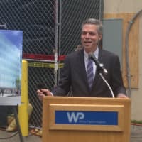 <p>White Plains Mayor Thomas Roach applauds the expansion of the Dickstein Cancer Treatment Center. </p>
