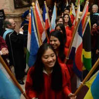 <p>Manhattanville College students process through historic Reid Castle before receiving their degrees.</p>