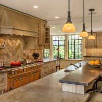 <p>The home at 229 East Hunting Ridge Road in Stamford includes a stunning kitchen island.</p>