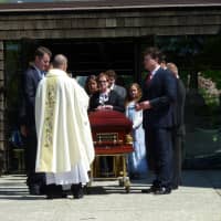 <p>Gary McKeon&#x27;s casket is brought outside of St. John the Evangelist Church in Mahopac.</p>