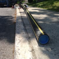 <p>This 4-inch diameter plastic pipe will be inserted into the existing gas mains in the Washingtonville neighborhood. </p>