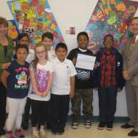 <p>Students at Highview Elementary School in Greenburgh show their murals. </p>