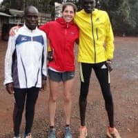 <p>Milly Wade-West, a running and strength conditioning coach, meets runners from Kenya during a marathon in March.</p>