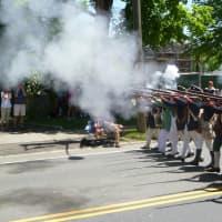 <p>Revolutionary War re-enactors fire muskets during last year&#x27;s Memorial Day Parade in Ridgefield.	 </p>