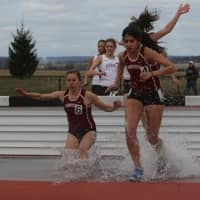<p>New Canaan&#x27;s Stephanie Benko, left, competes in steeplechase for Lafayette College.</p>