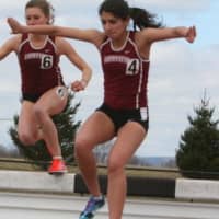 <p>Stephanie Benko, left, of New Canaan won the Patriot League championship in the steeplechase.</p>