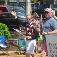 <p>Members of the Darien Historical Society wave the red, white and blue in the annual parade. </p>