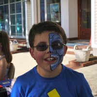 <p>Dylan Curran, 13, got his face painted at Westport&#x27;s annual Art About Town.</p>