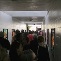 <p>People attending Westport&#x27;s annual Art About Town street fair crowd into the new art installation in the tunnel by Acqua restaurant. </p>