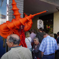 <p>People attending Westport&#x27;s annual Art About Town street fair crowd into the new art installation in the tunnel by Acqua restaurant. </p>