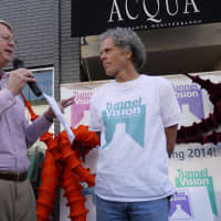 <p>Westport Downtown Merchants Association President Steve Desloge speaks about artist Miggs Burroughs and his installation in the tunnel off Main Street by Acqua. </p>