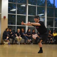 <p>A participant shows off his moves in his choreographed dance. </p>