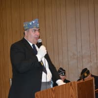 <p>Mike Palumbo sings &quot;God Bless America&quot; at Mount Kisco&#x27;s Memorial Day service.</p>