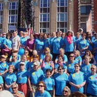 <p>Cancer survivors gather onstage at the Hope in Motion Walk and Run.</p>
