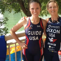 <p>Amy Dixon, right, and guide Caroline Gaynor take a picture after finishing third in Sunday&#x27;s race.</p>