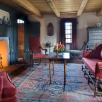 <p>The living room showcases furniture from a past era at 5 Meeting House Road in Pawling, N.Y.</p>